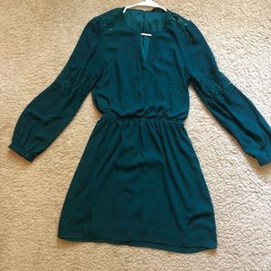 Dark green dress with lace detail